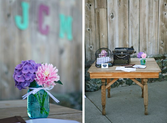Vintage typewriter and bird cage at the Guest Book table