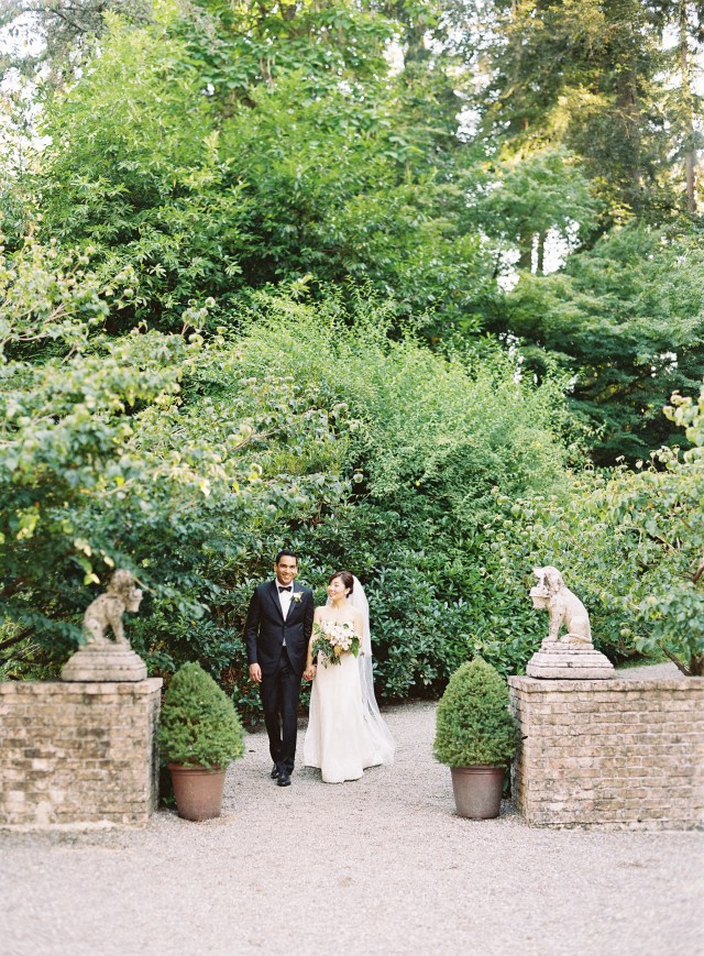 Jennifer and Salil in the garden after the wedding